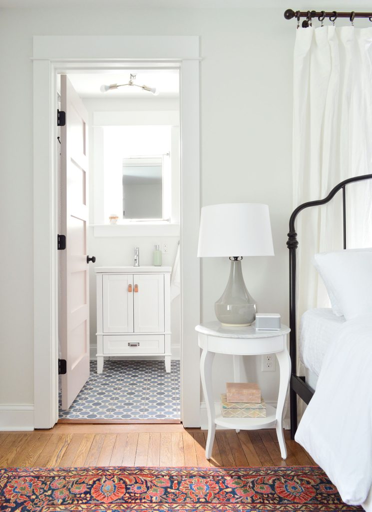 Traditional Bedroom With Iron Bed Spare White Walls Extra White Trim