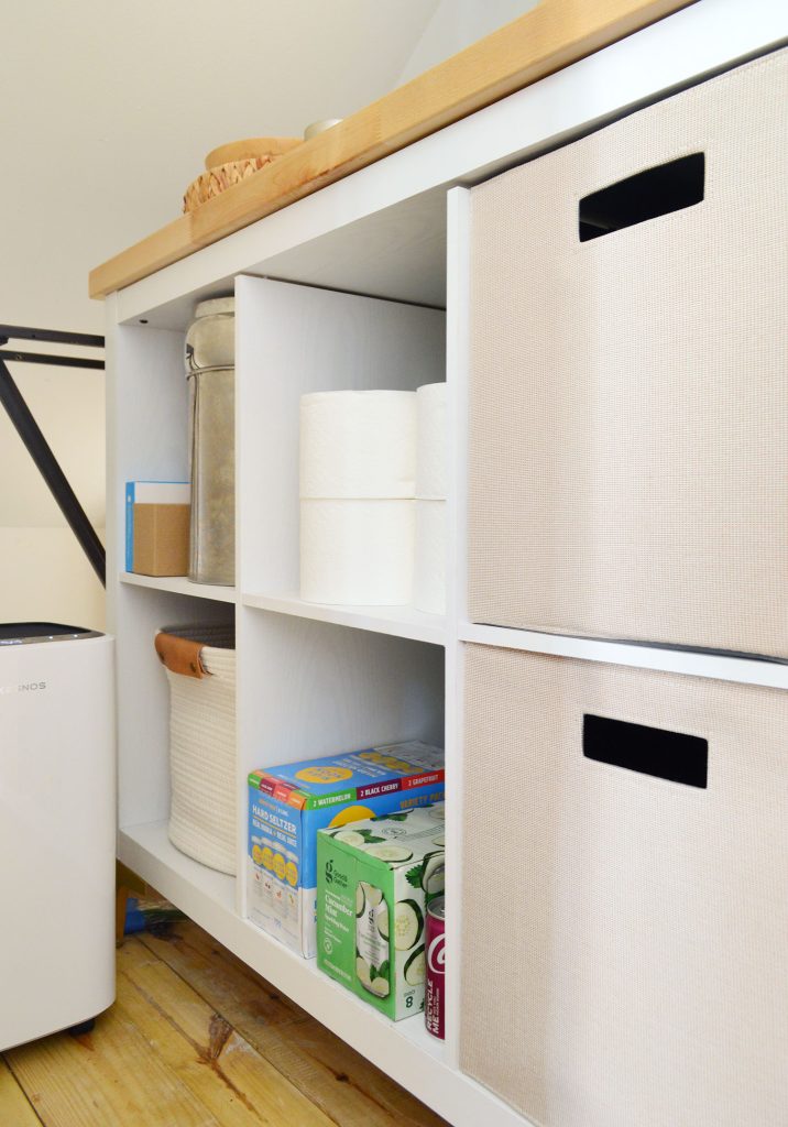 Cubby Storage Shelf In Utility Closet With Butcher Block Counter