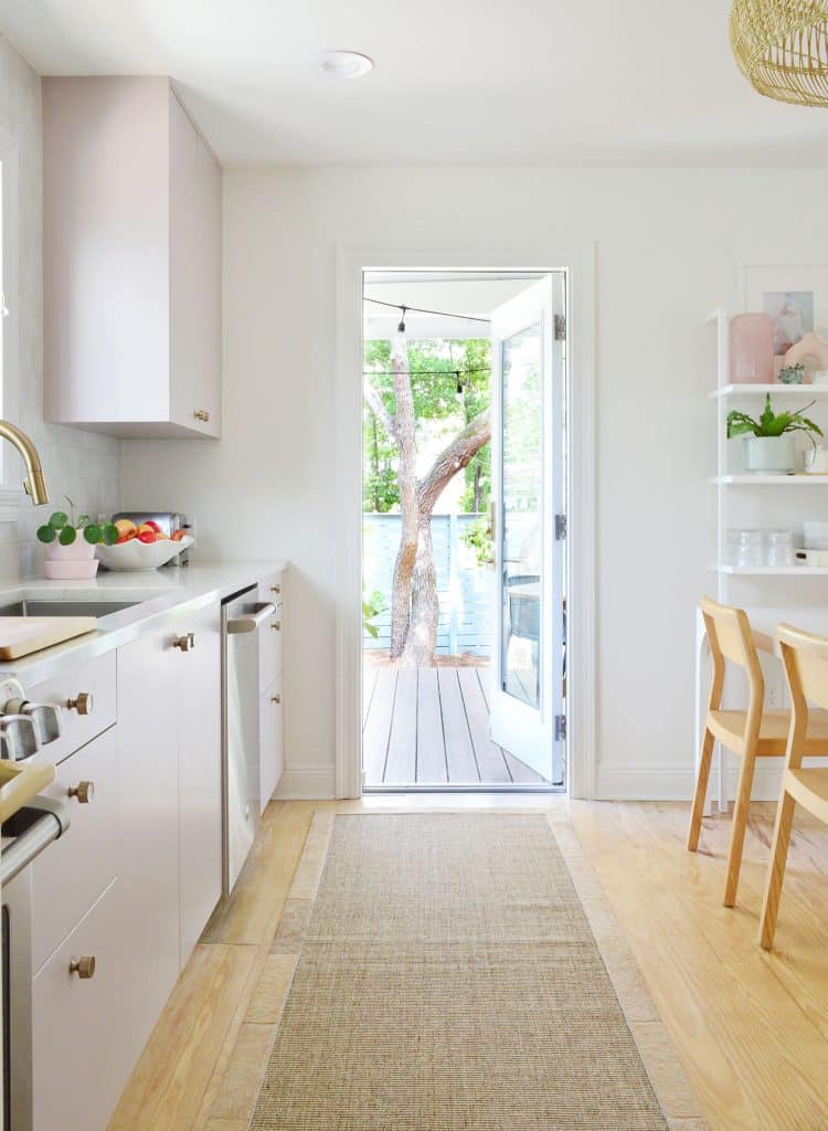 Open Door View To Kitchen Porch With Trees Outside