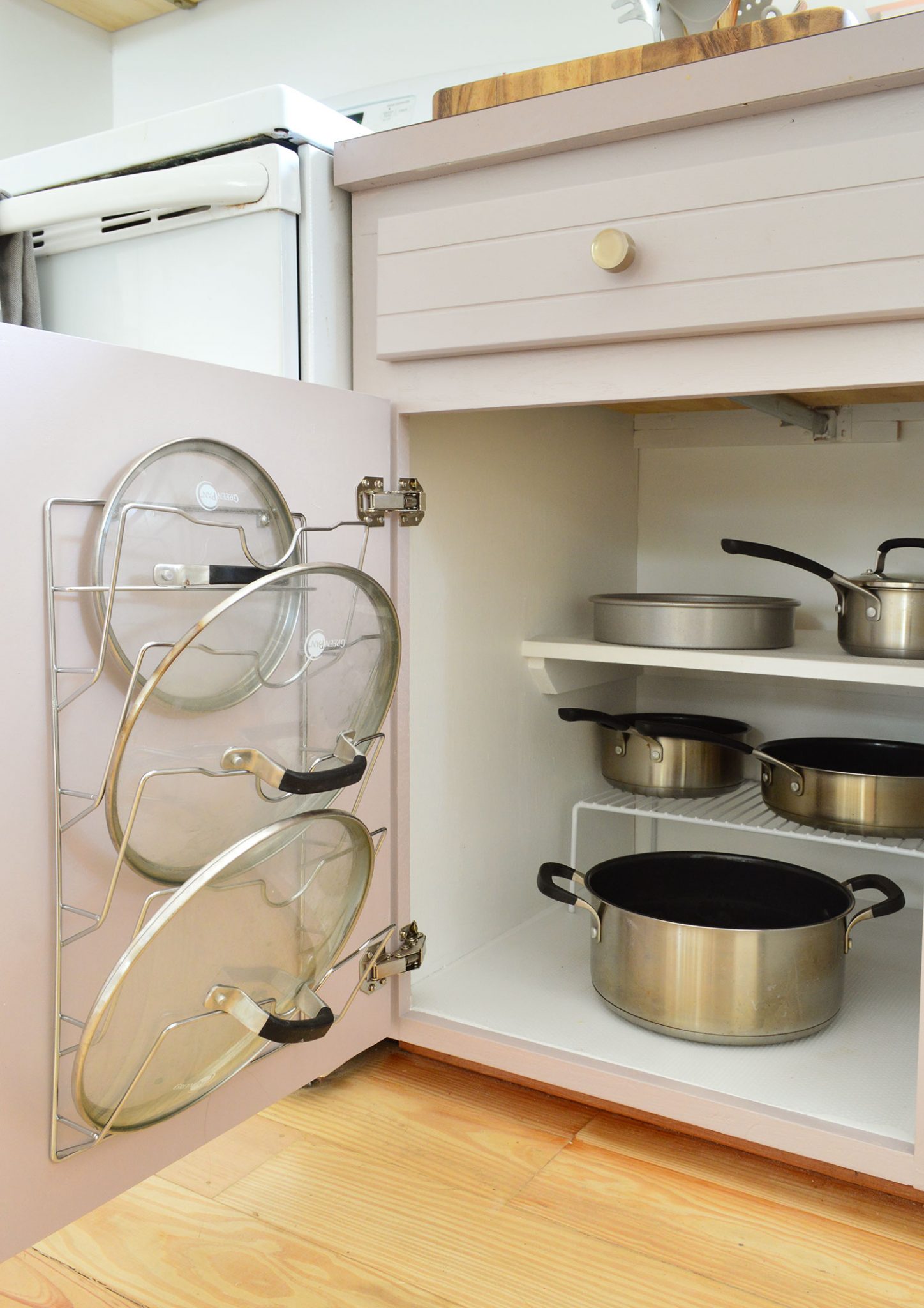 Before Photo Of Pots And Pan Cabinet With On Door Lid Storage Wire Rack